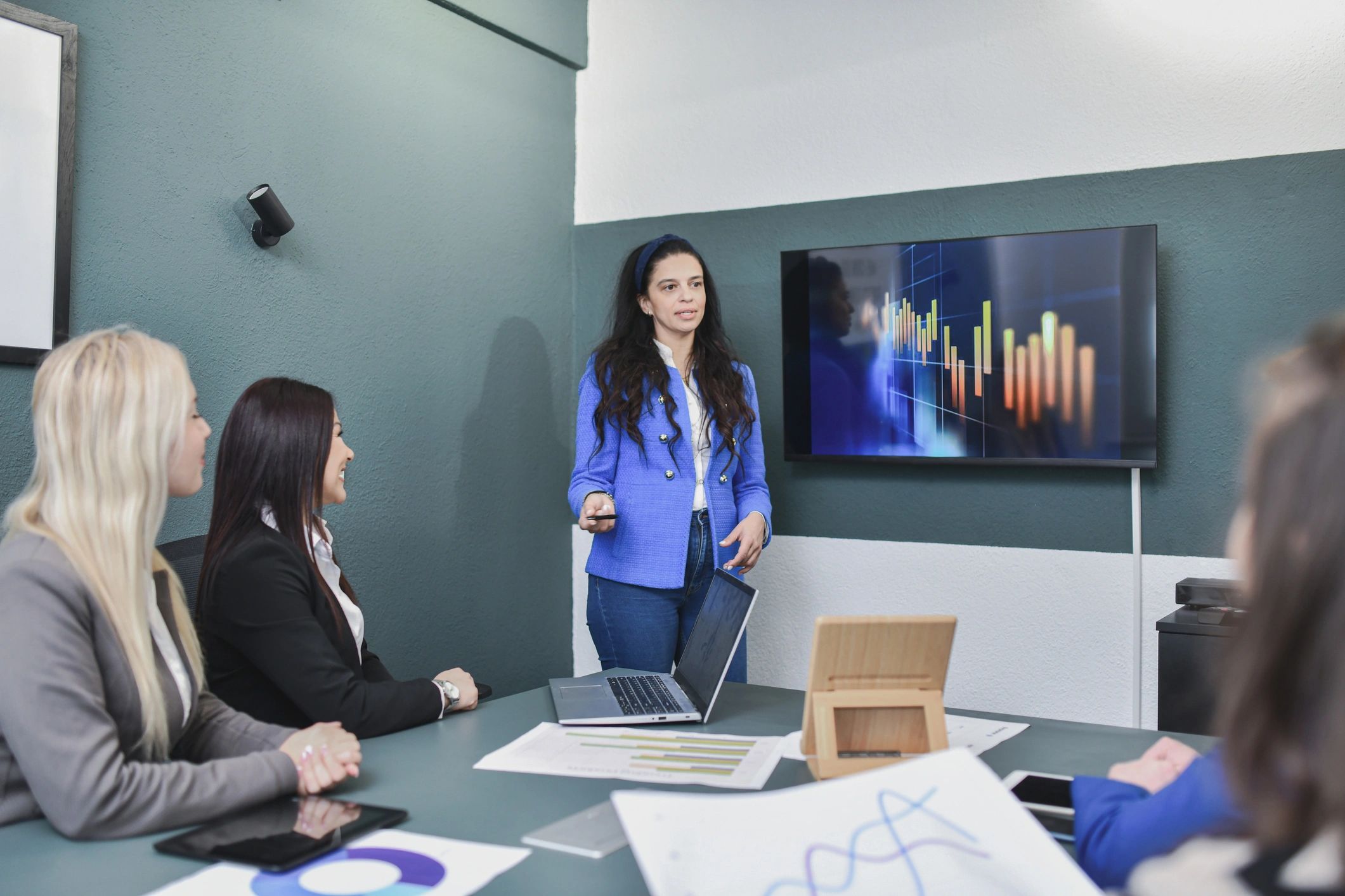 Marketing team reviewing digital campaign results together