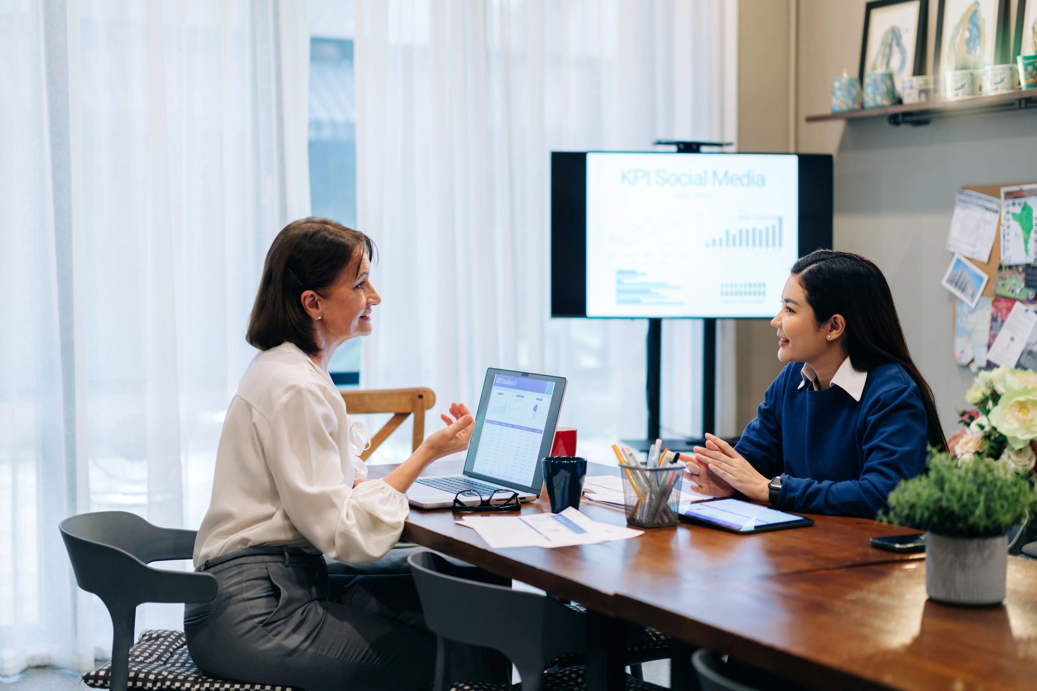 Business professionals reviewing digital marketing performance